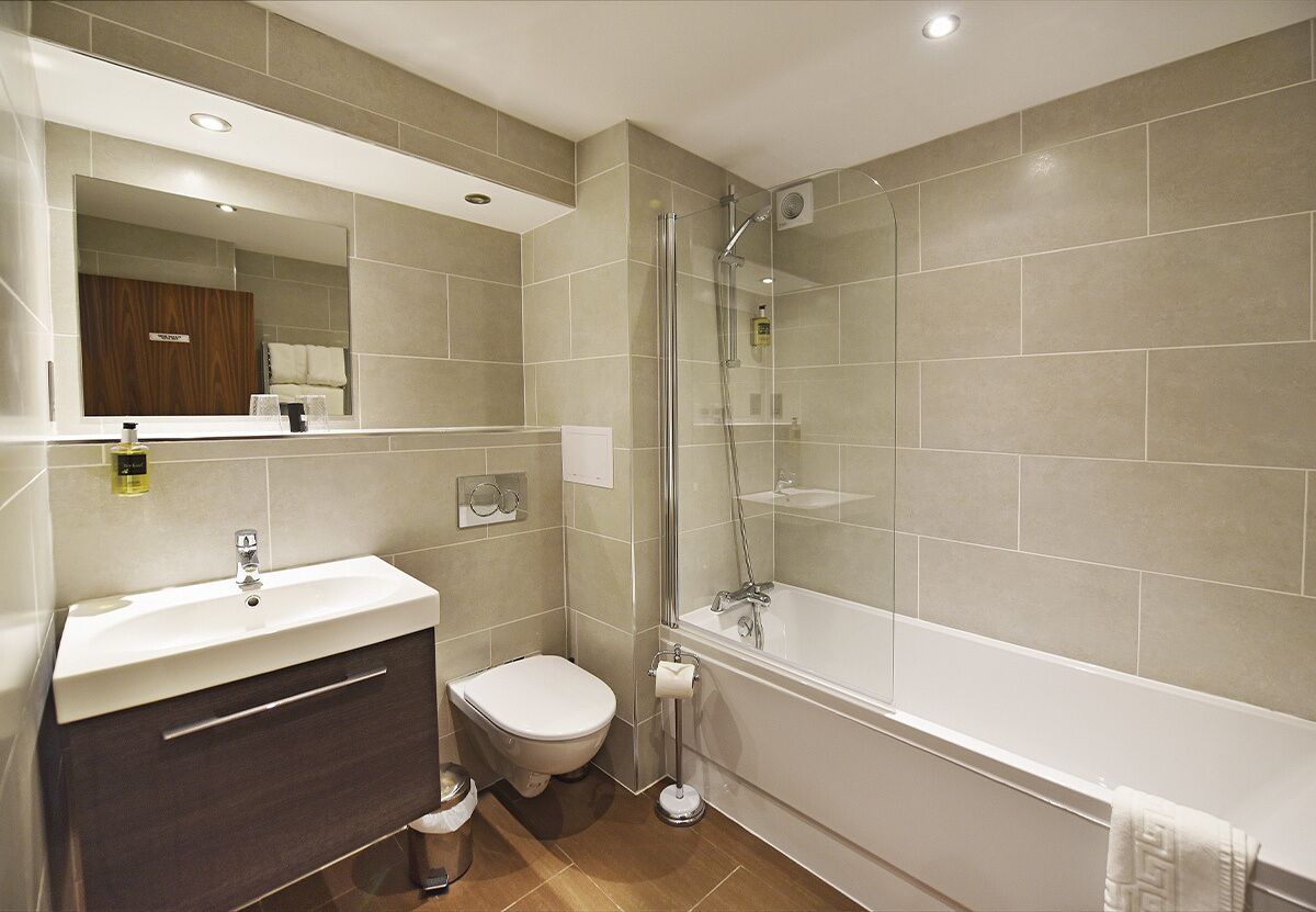 executive suite | bathroom | free toiletries, hair dryer, towels