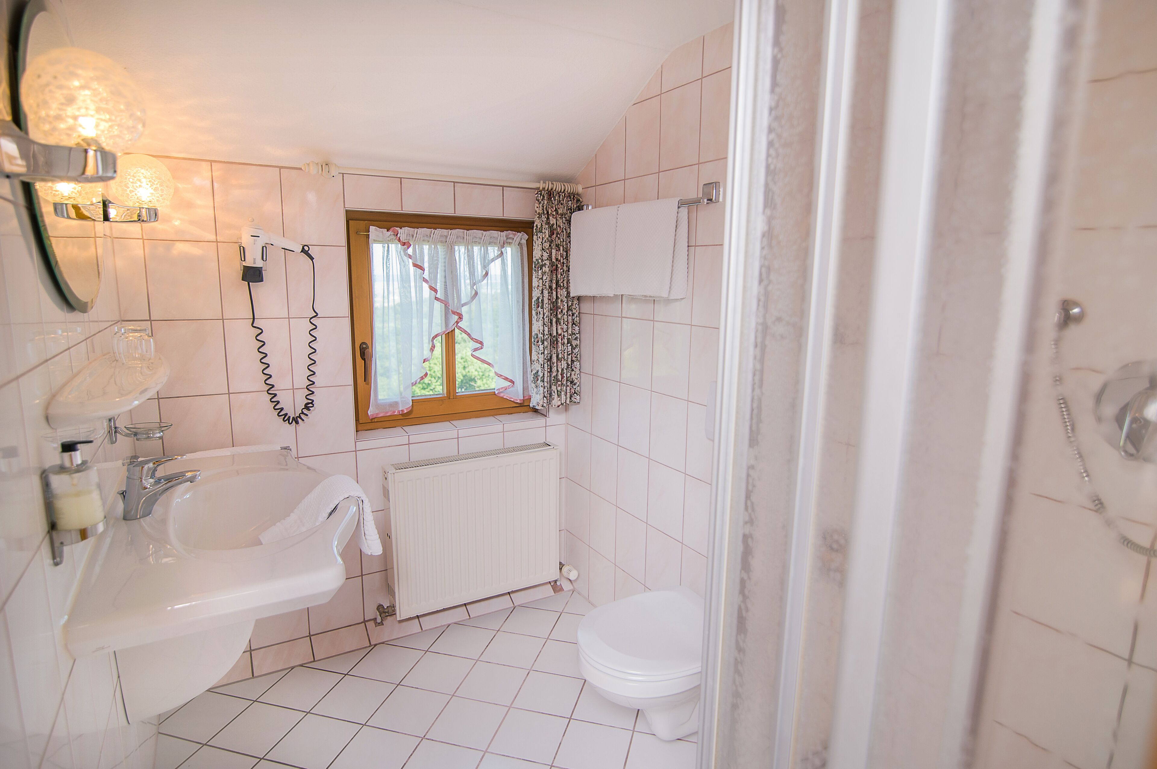 classic double room | bathroom | shower, hair dryer, towels, soap