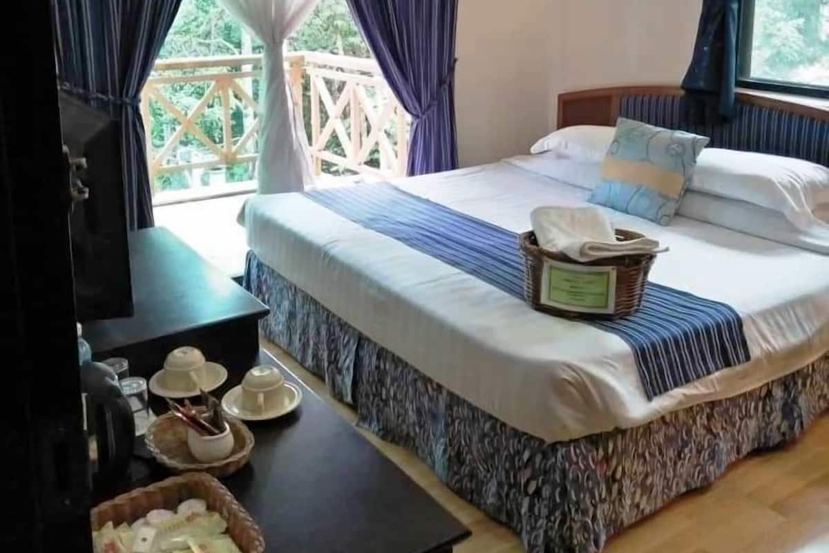 Standaard tweepersoonskamer | 1 slaapkamer, een minibar, een bureau, beddengoed