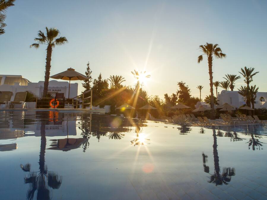 Indoor pool, seasonal outdoor pool, pool umbrellas, sun loungers