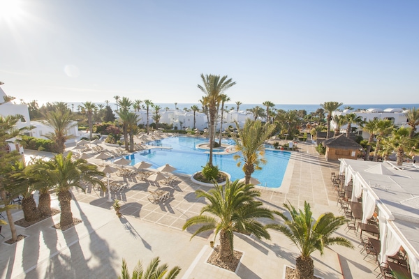 Indoor pool, seasonal outdoor pool, pool umbrellas, sun loungers