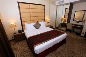 Deluxe Suite, Garden View | Minibar, in-room safe, desk, soundproofing - AlHamra Hotel (Sharjah)