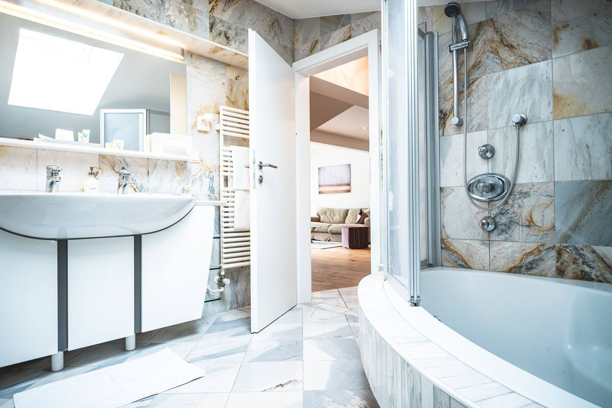 panoramic penthouse, 1 bedroom, terrace, mountain view | deep-soaking bathtub