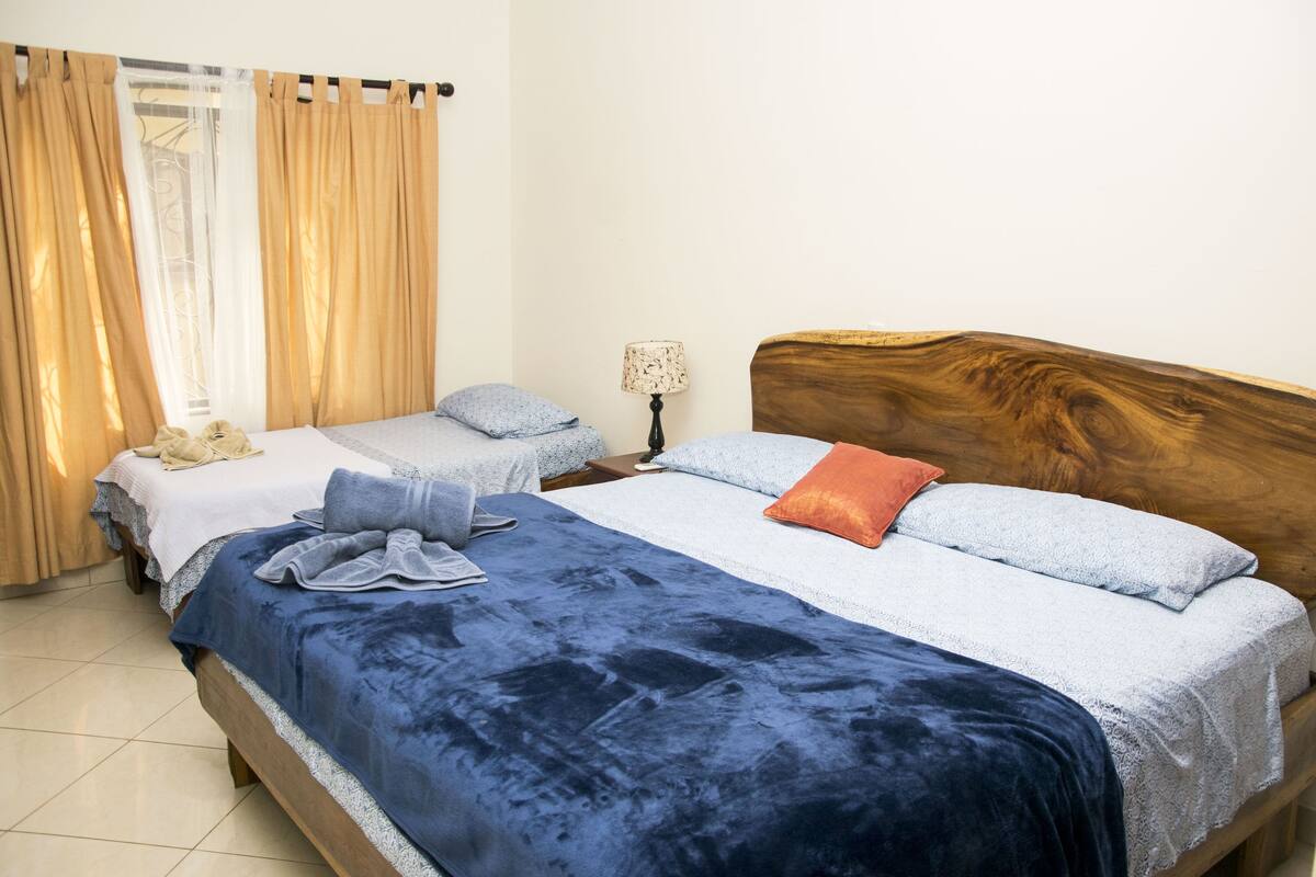 Standard Triple Room, 1 Bedroom, Garden Area | Minibar, in-room safe, laptop workspace, blackout drapes