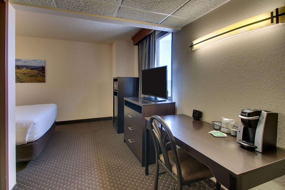 Desk, laptop workspace, blackout curtains, iron/ironing board