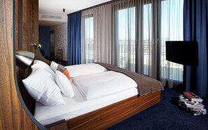 Kamer | Luxe beddengoed, donsdekens, een gratis minibar, een kluis op de kamer