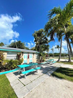 Family Cabin, Kitchen, Partial Ocean View | Desk, laptop workspace, blackout drapes, iron/ironing board