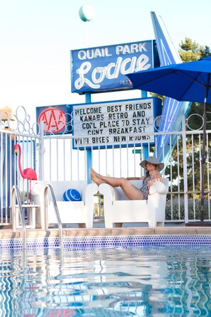 Outdoor pool, pool umbrellas, sun loungers