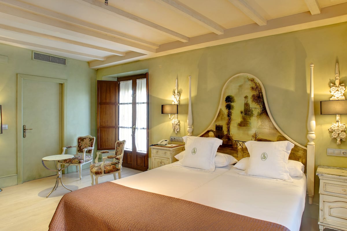 Superior Double Room | Down comforters, memory foam beds, minibar, individually decorated