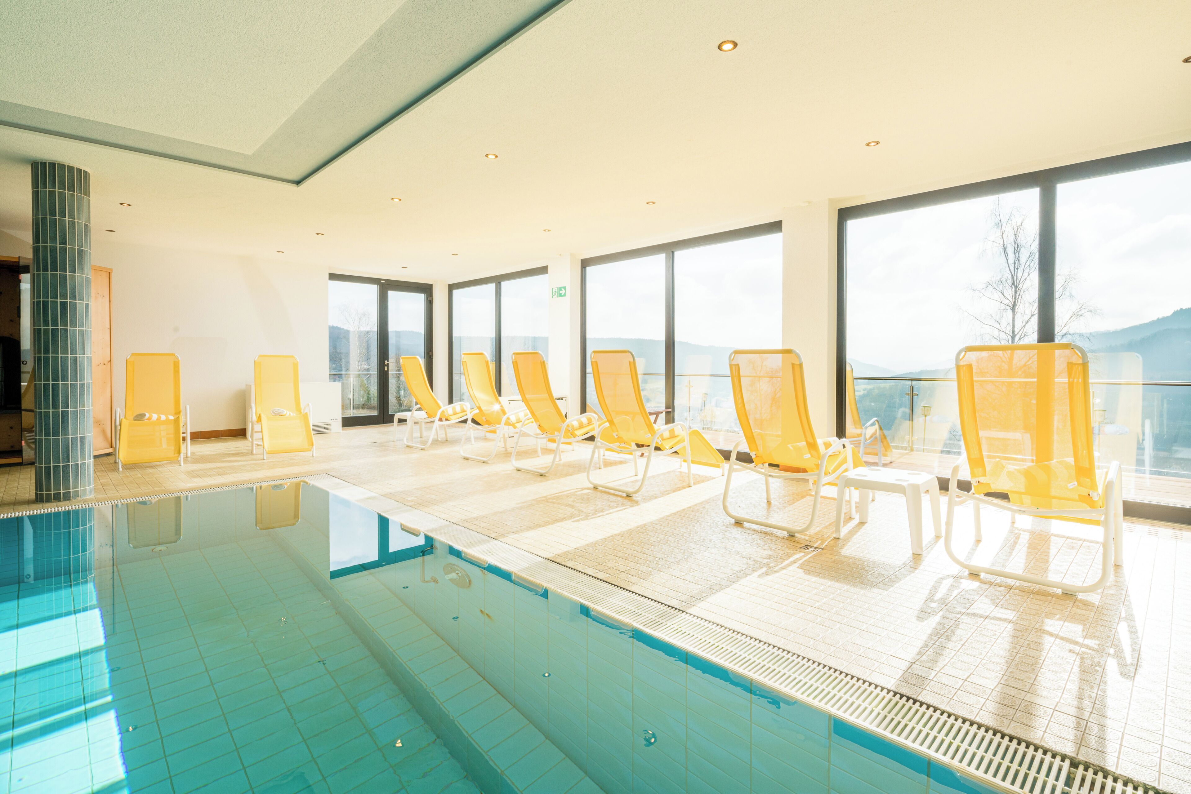 Indoor pool, open 7:00 AM to 9:00 PM, pool loungers