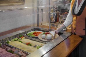 Dagelijks ontbijtbuffet (EUR 19 per persoon)