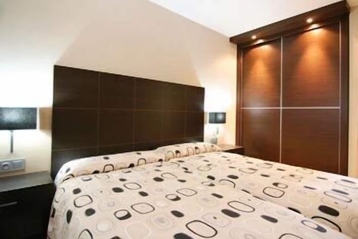 1 habitación, edredón y camas con efecto memoria