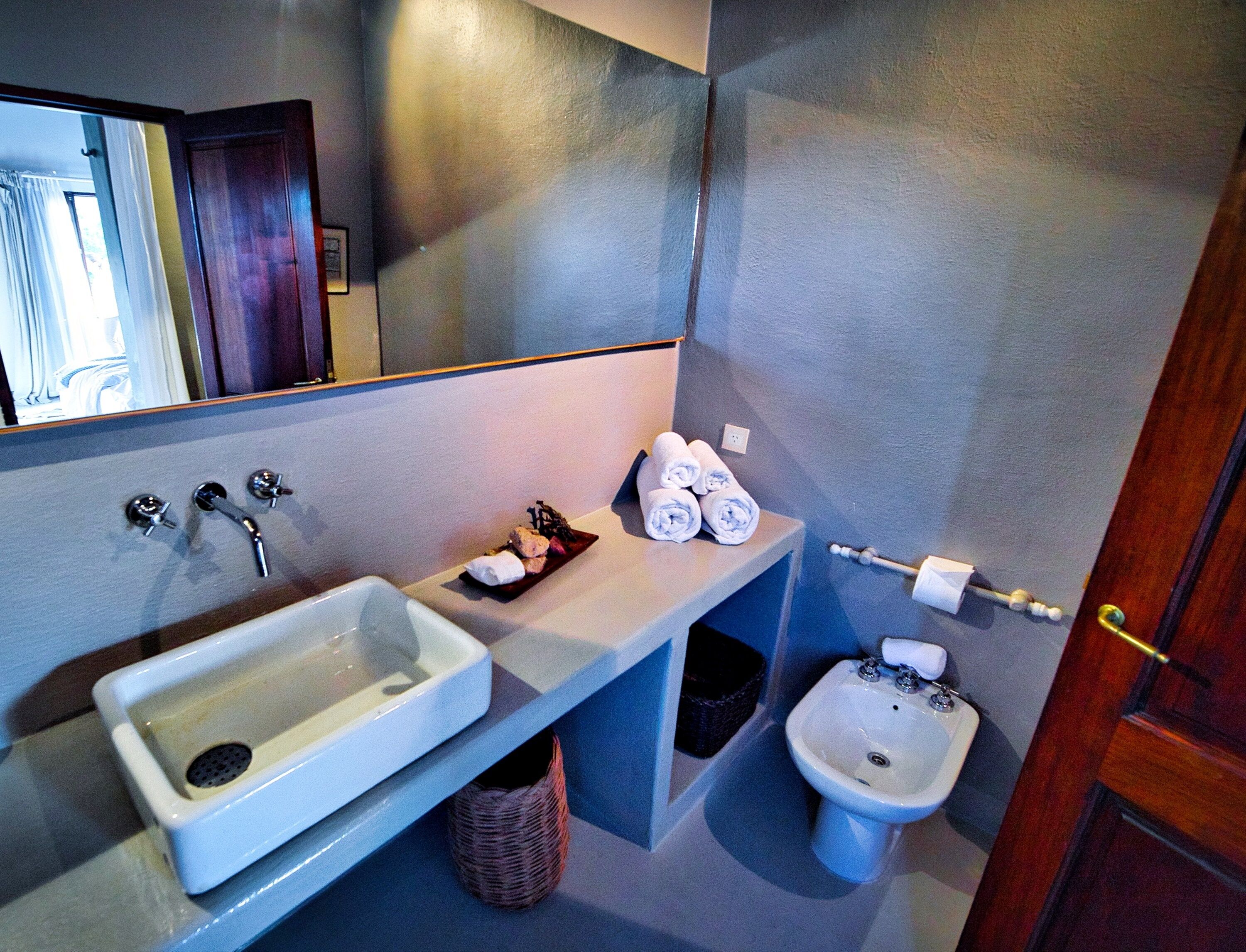 deluxe double room | bathroom | designer toiletries, hair dryer, bidet, towels