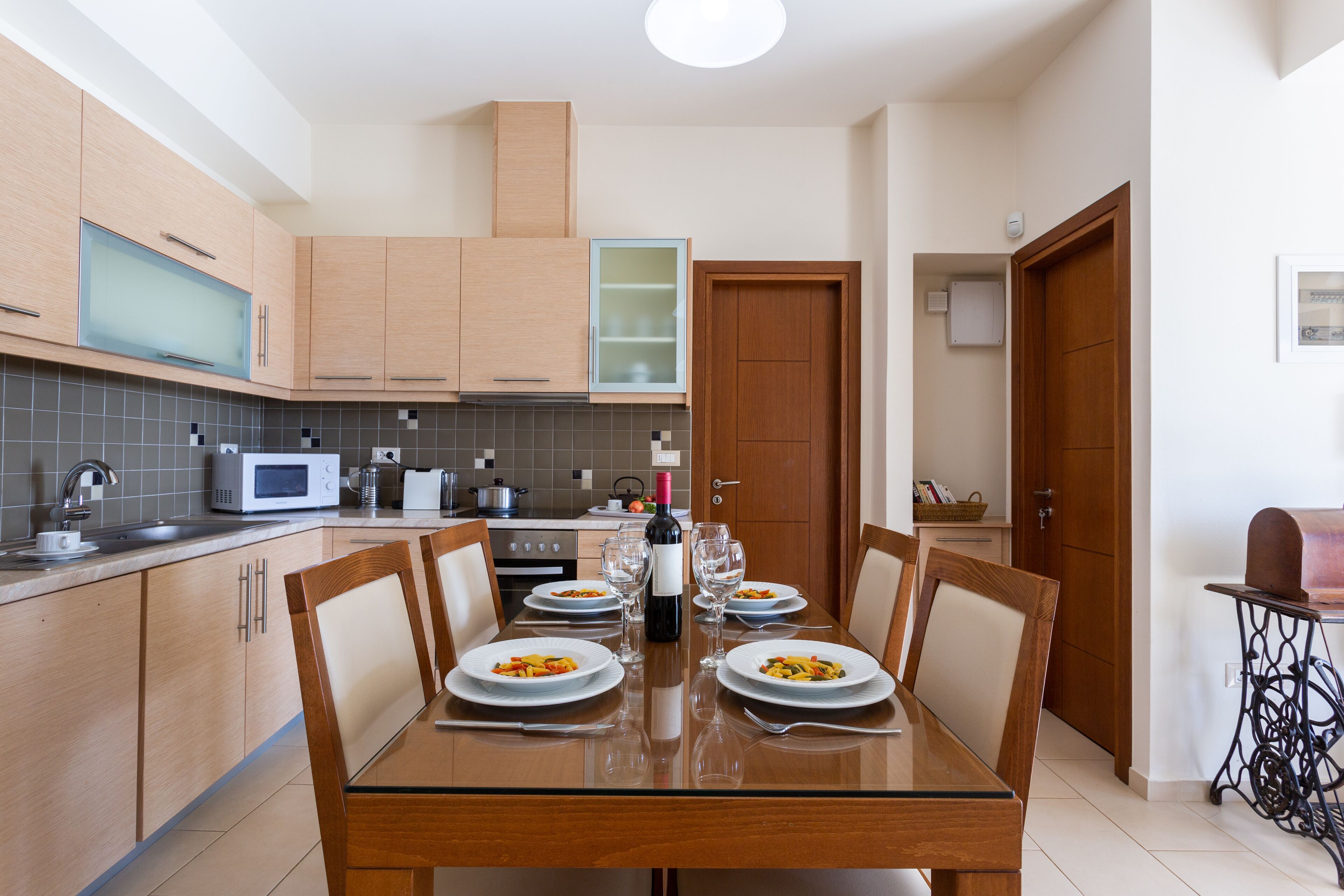 apartment, shared pool  (spermo) | private kitchen | full-sized fridge, microwave, oven, stovetop