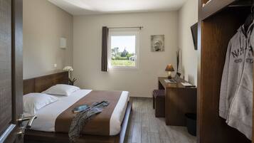 Desk, blackout drapes, soundproofing, iron/ironing board