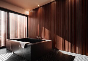 Sky View Premium Suite | Bathroom | Separate tub and shower, hair dryer, slippers, towels
