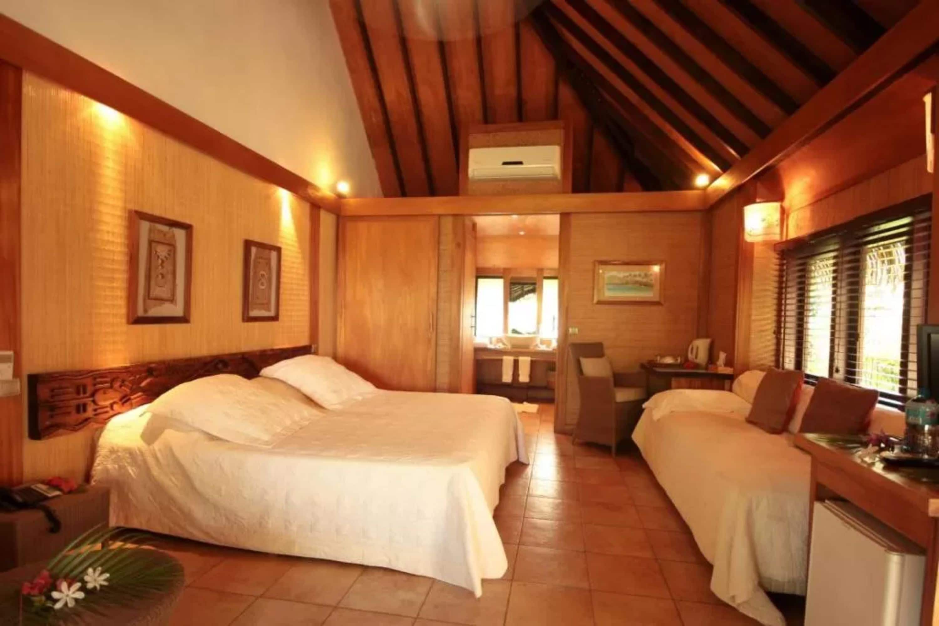 bungalow, garden area | minibar, in-room safe, individually decorated, individually furnished