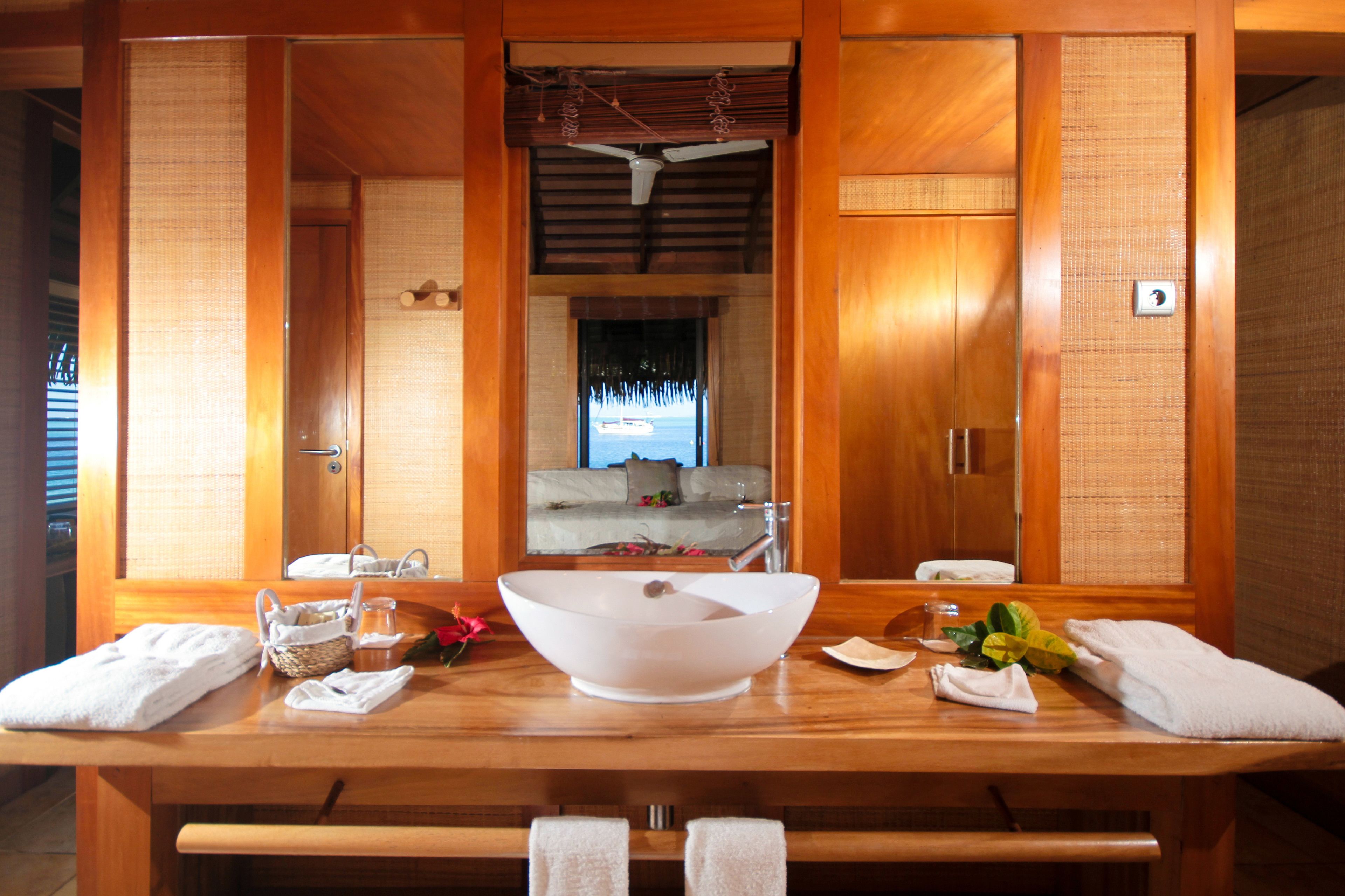 deluxe bungalow, beachside | bathroom | shower, free toiletries, hair dryer, towels