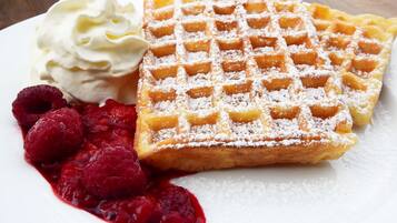 Daily buffet breakfast (USD 25.00 per person)