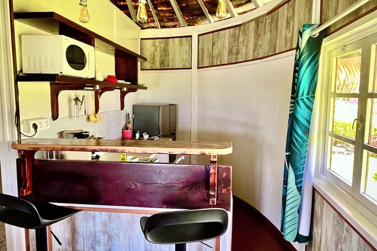 honeymoon bungalow, beachside | private kitchen | microwave, stovetop, electric kettle, cookware/dishes/utensils