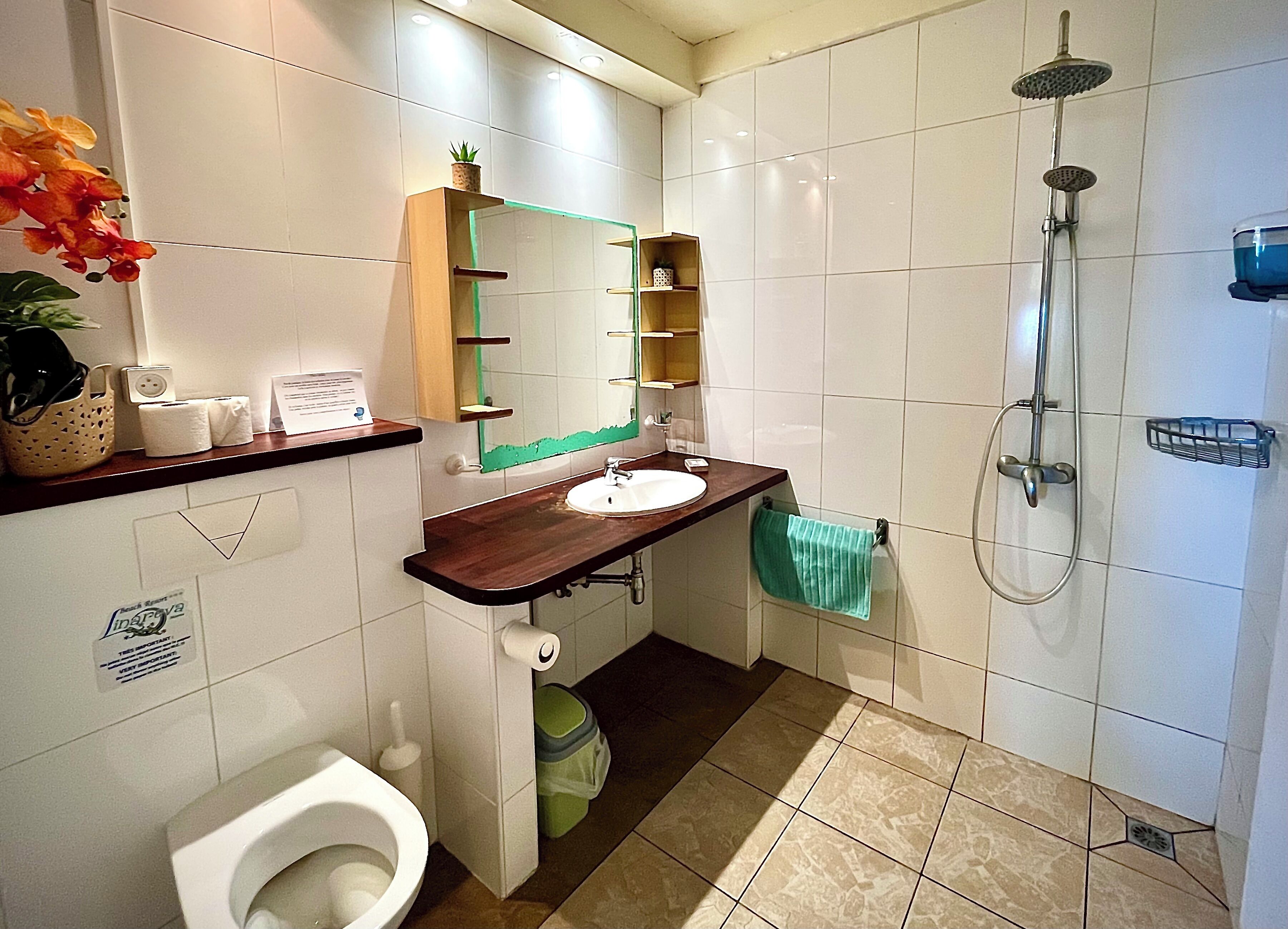 suite, beachside | bathroom | shower, rainfall showerhead, hair dryer, towels
