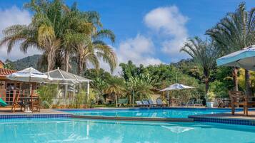 Outdoor pool, pool umbrellas, sun loungers