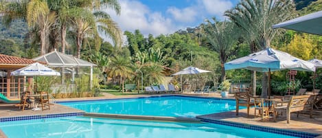 Outdoor pool, pool umbrellas, pool loungers