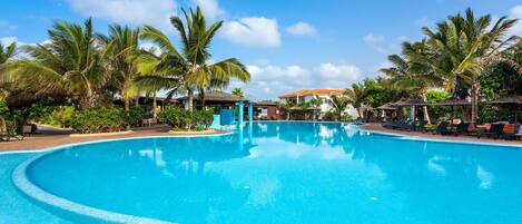 4 outdoor pools, cabanas (surcharge), pool umbrellas