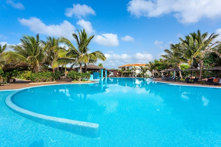 4 outdoor pools, cabanas (surcharge), pool umbrellas