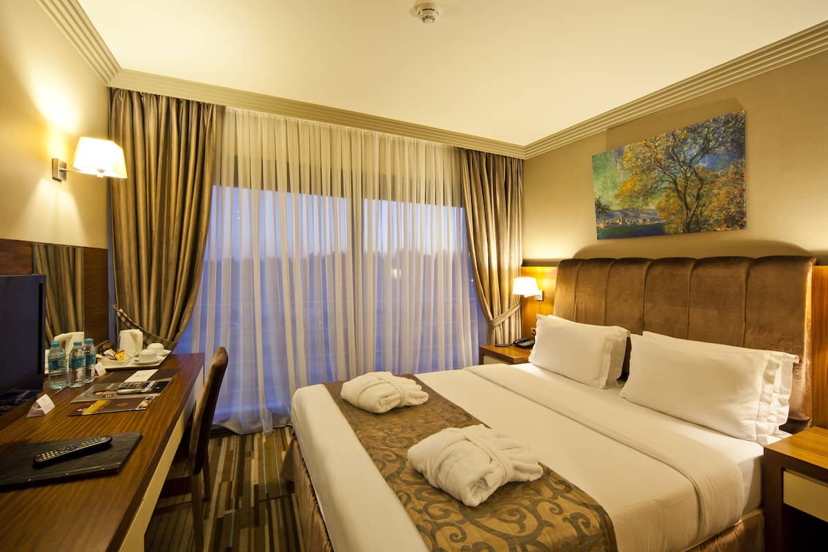 Premium bedding, in-room safe, desk, soundproofing