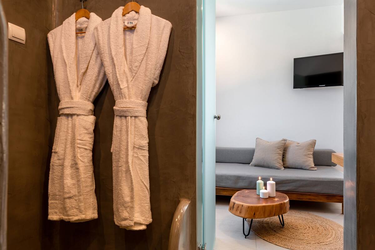 junior double or twin room | bathroom | shower, rainfall showerhead, hair dryer, towels