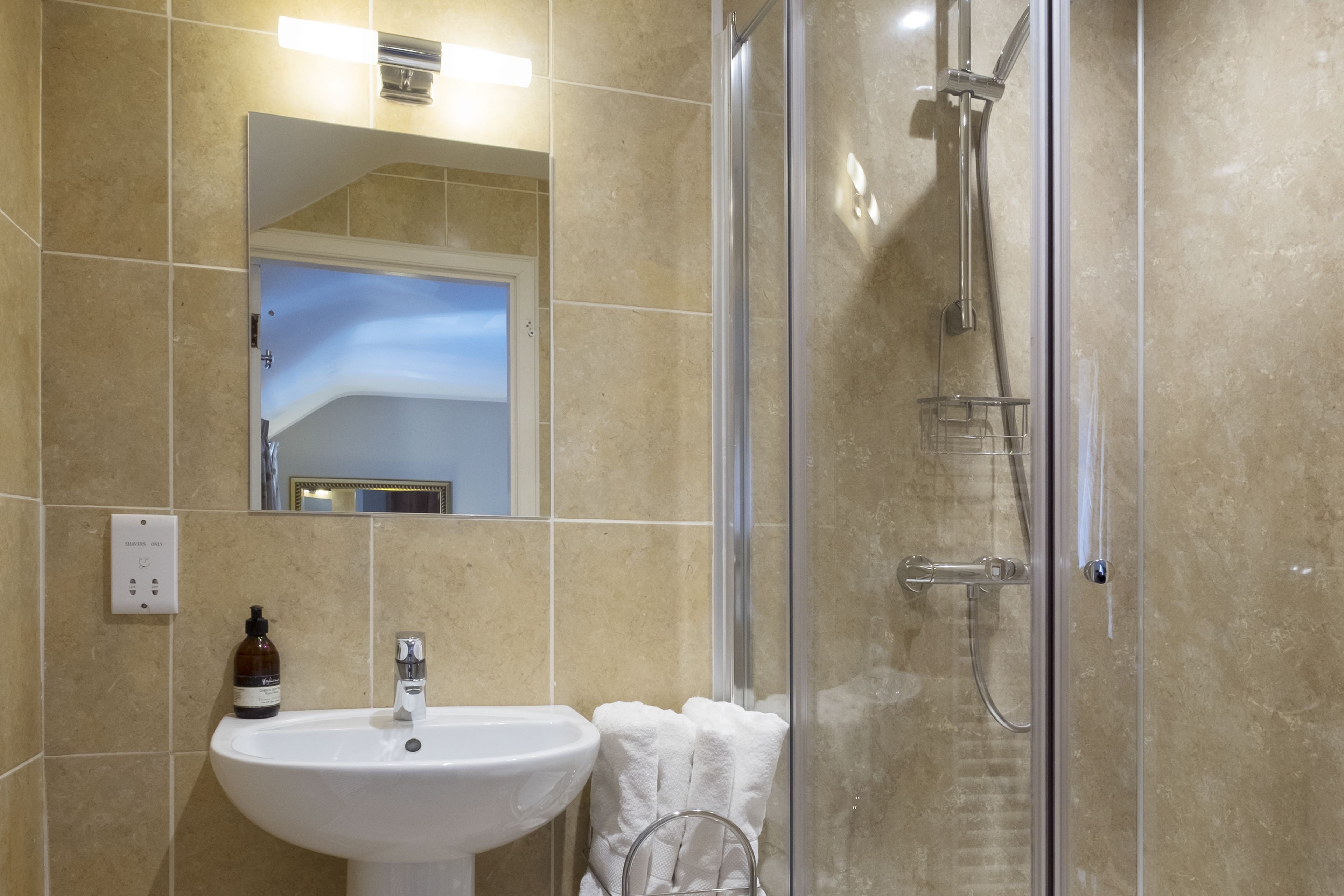 Shower, hair dryer, towels