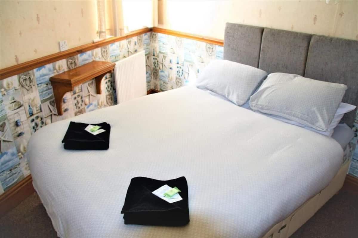 Habitación doble | Espacio para trabajar con laptop, cunas gratuitas y wifi gratis 