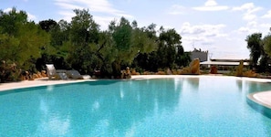 Outdoor pool, pool umbrellas, pool loungers