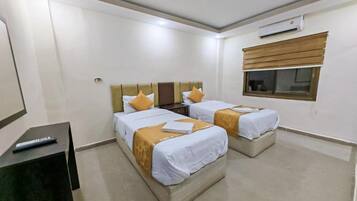 1 غرفة نوم وملاءات من القطن المصري وأسرّة بطبقة علوية مريحة