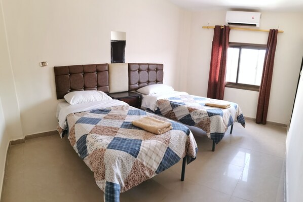 Double or Twin Room | 1 bedroom, Egyptian cotton sheets, pillowtop beds, in-room safe