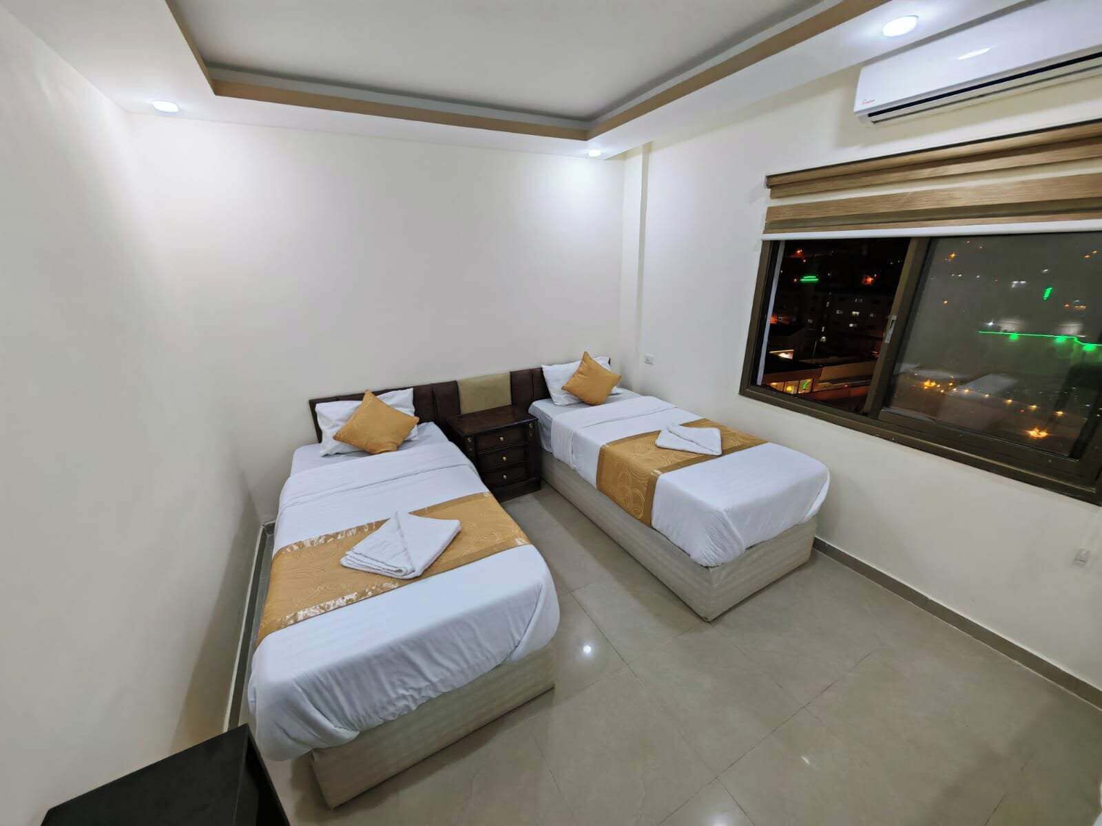 1 غرفة نوم وملاءات من القطن المصري وأسرّة بطبقة علوية مريحة