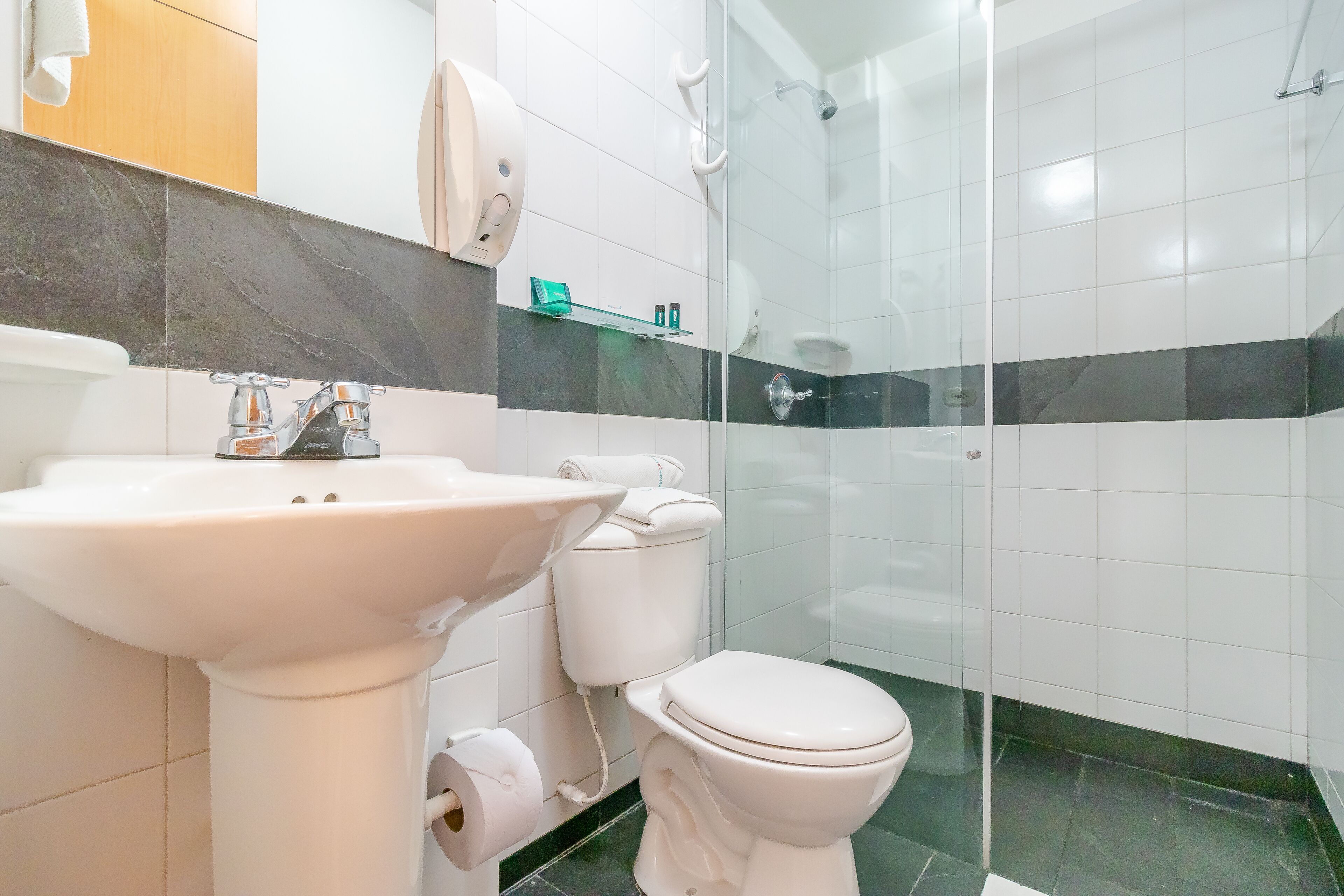 superior double room | bathroom | shower, hair dryer, towels