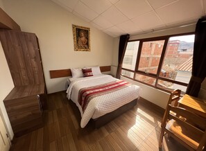 Habitación Premium doble | Colchones con acolchado adicional, wifi gratis, ropa de cama