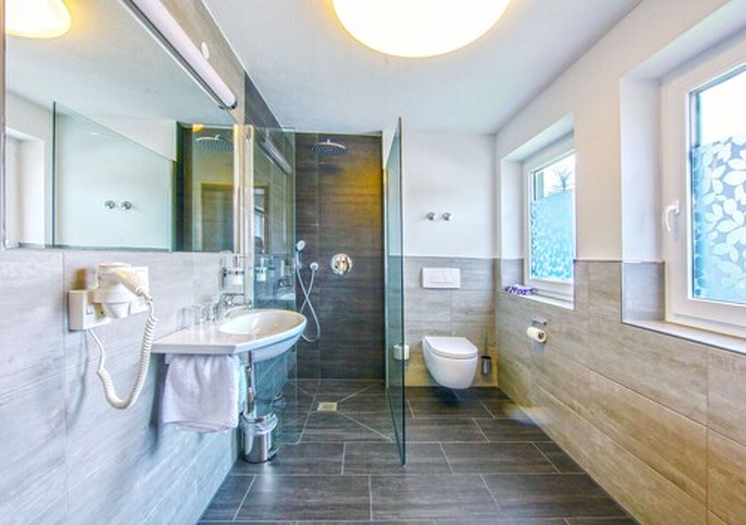 double room single use | bathroom | shower, hair dryer, towels
