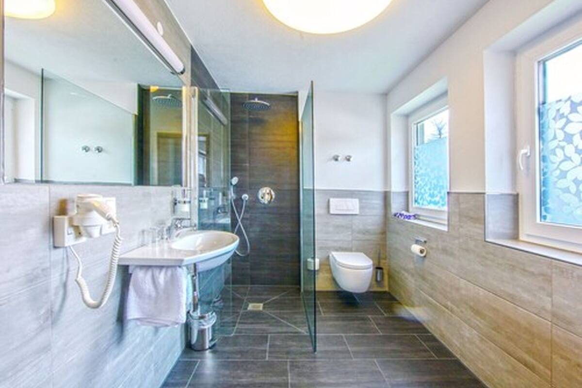 double room single use | bathroom | shower, hair dryer, towels