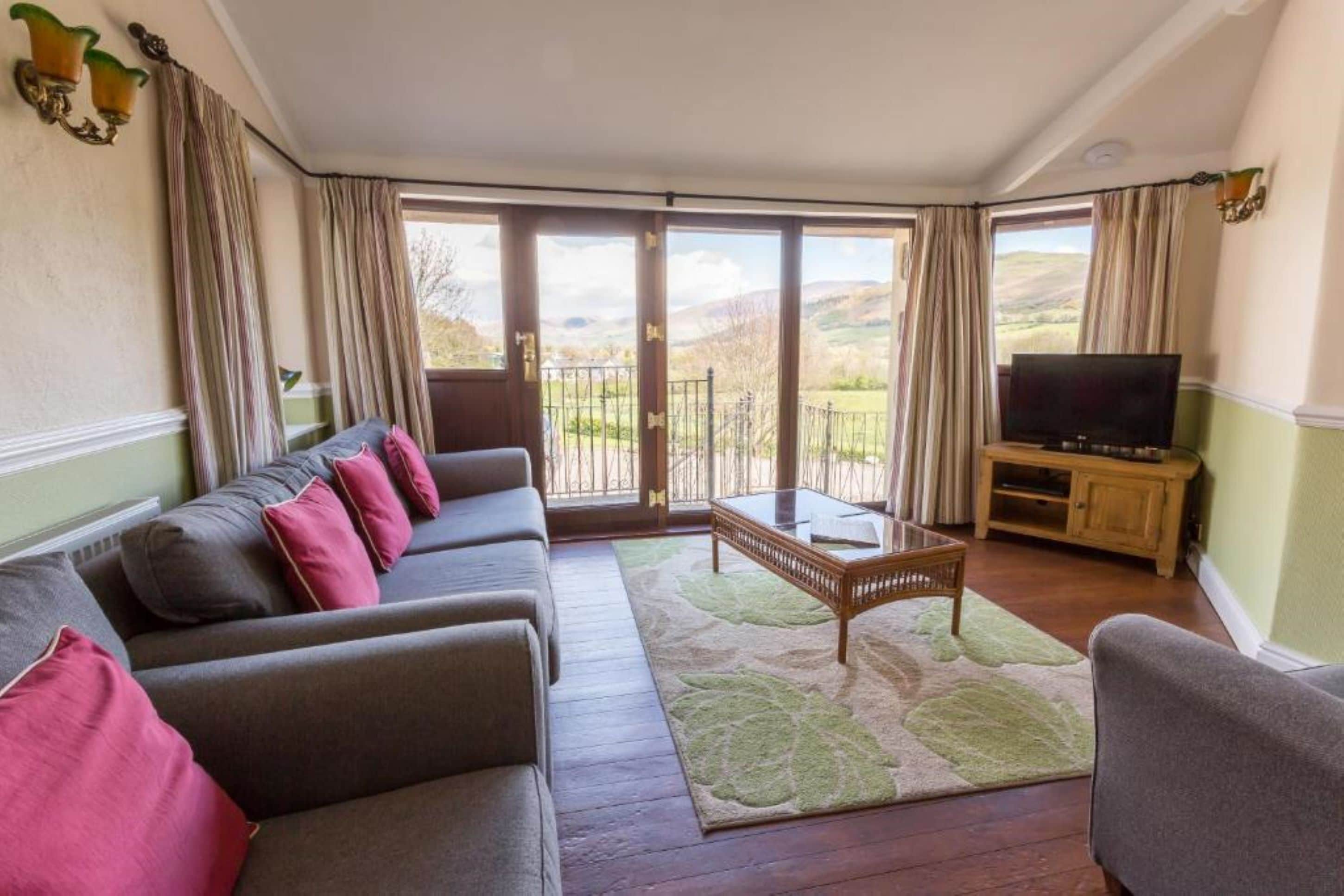 Apartamento, 2 habitaciones (Skiddaw) | Sala de estar | Una televisión