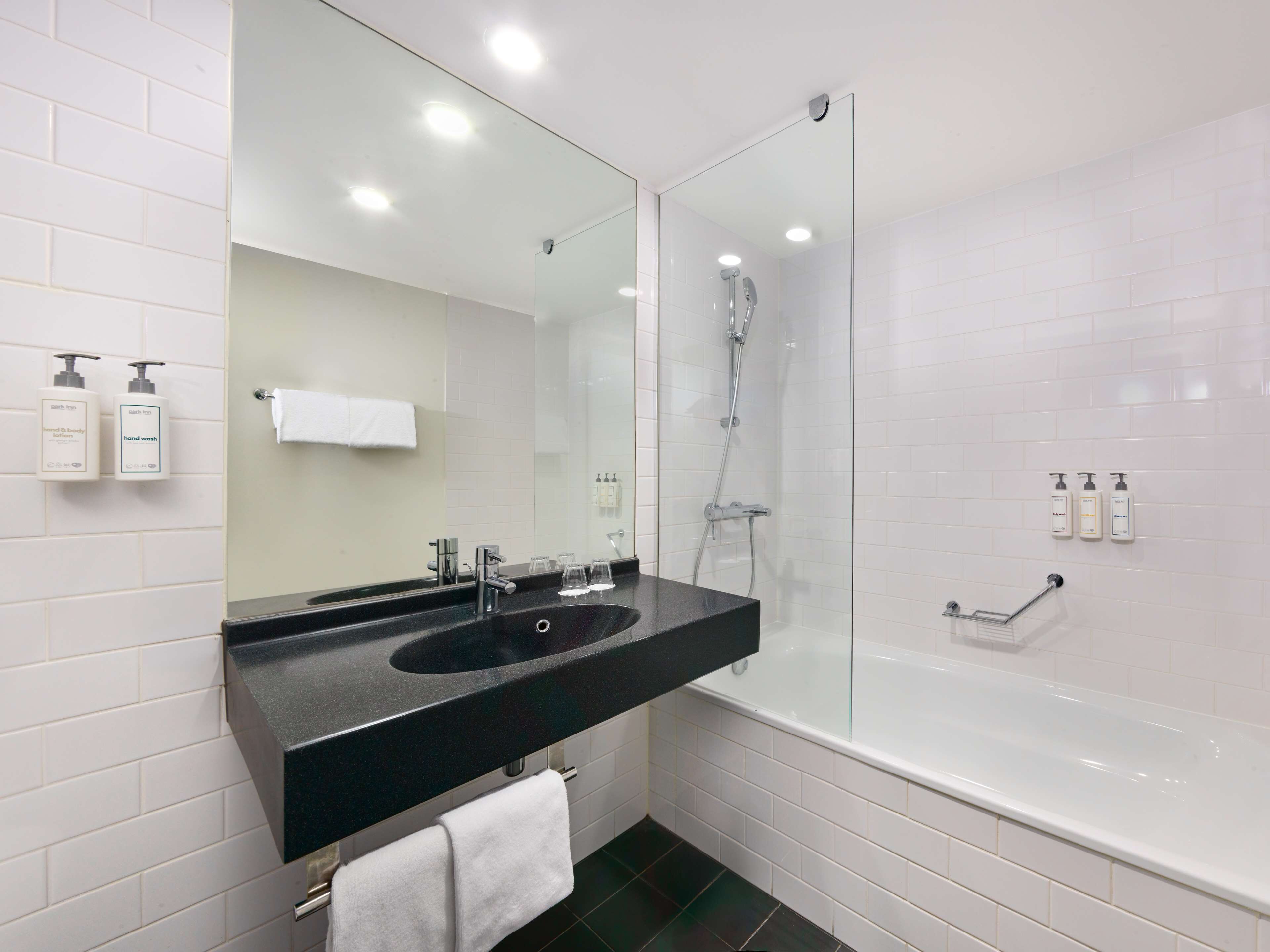superior room | bathroom | eco-friendly toiletries, hair dryer, towels, soap