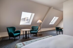 Suite junior | Ropa de cama de alta calidad y caja de seguridad en la habitación