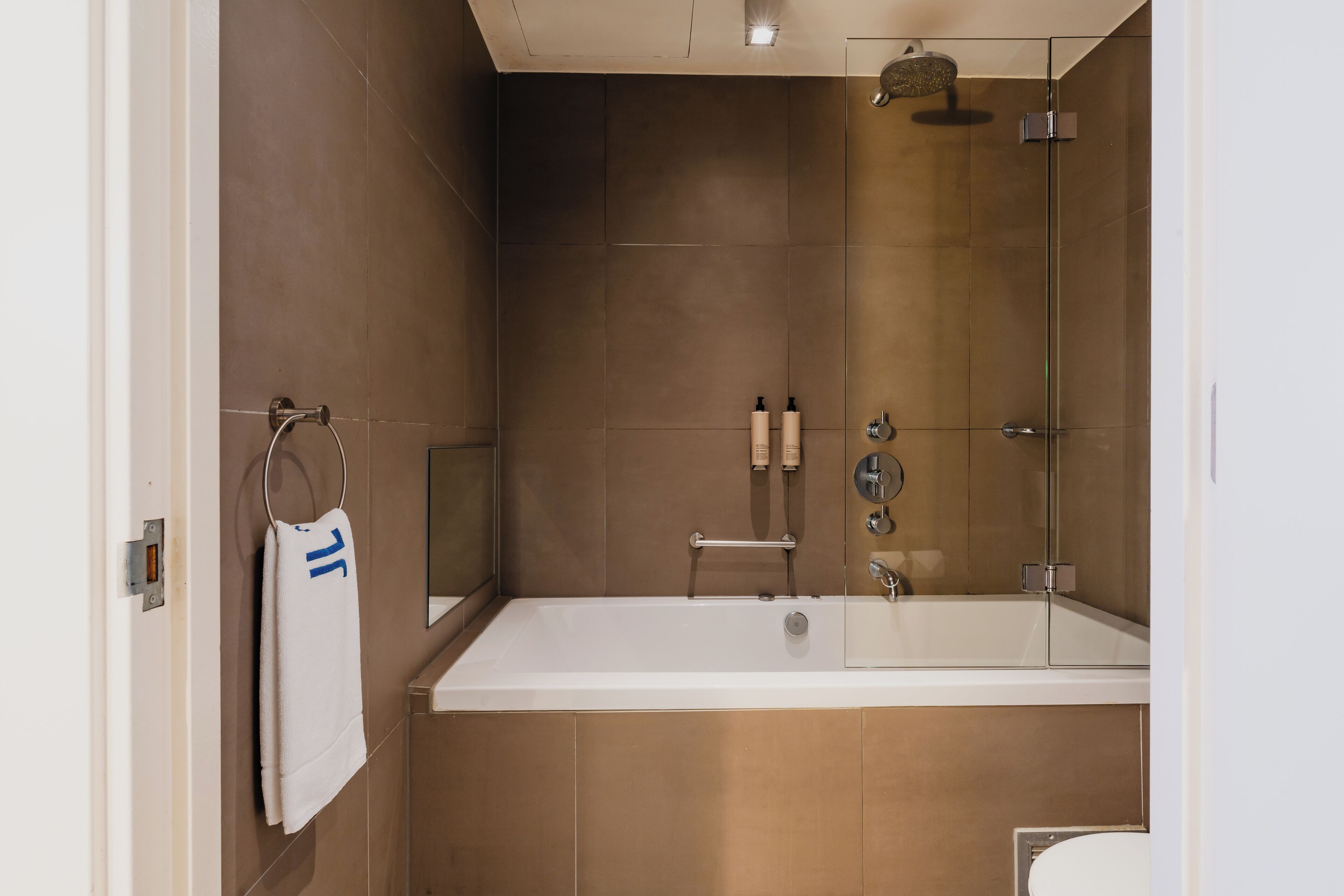 executive room (souterrain) | bathroom | rainfall showerhead, designer toiletries, hair dryer, bathrobes