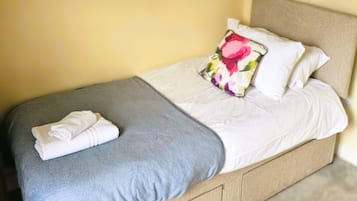 Quarto solteiro, suíte