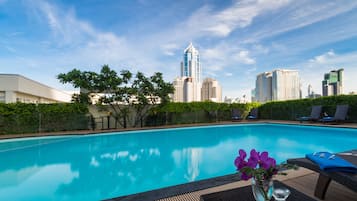 Outdoor pool, pool umbrellas, pool loungers