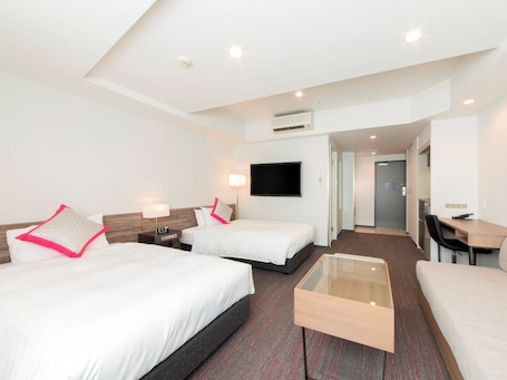 Premium bedding, down comforters, memory foam beds, in-room safe