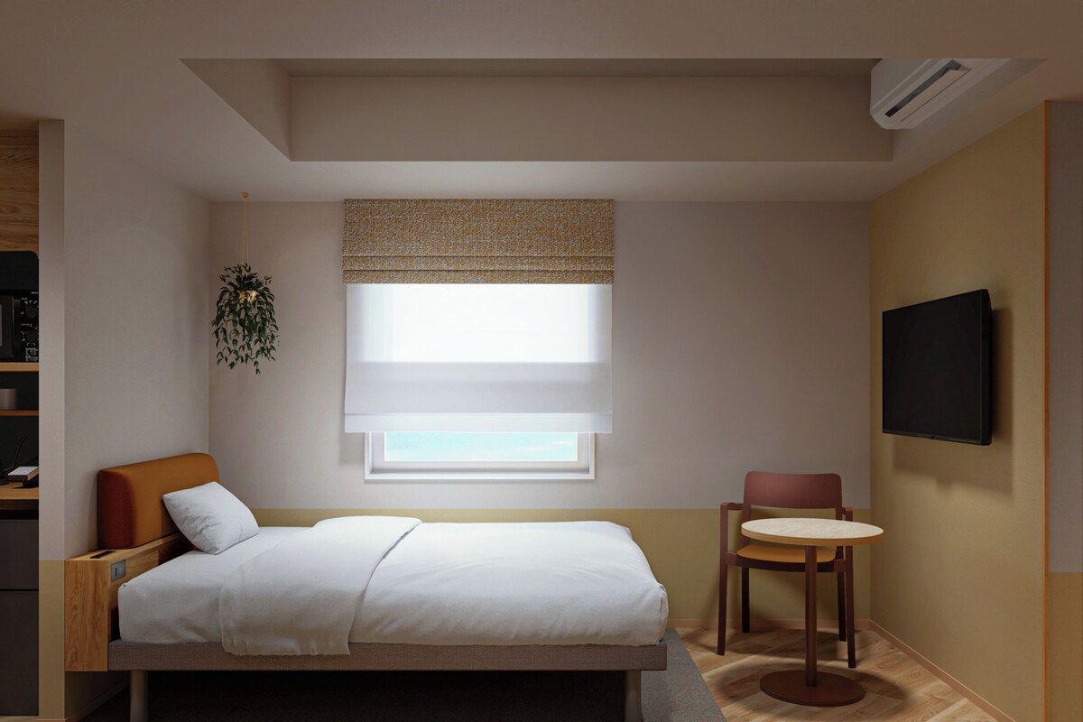 Premium bedding, down duvets, memory-foam beds, in-room safe