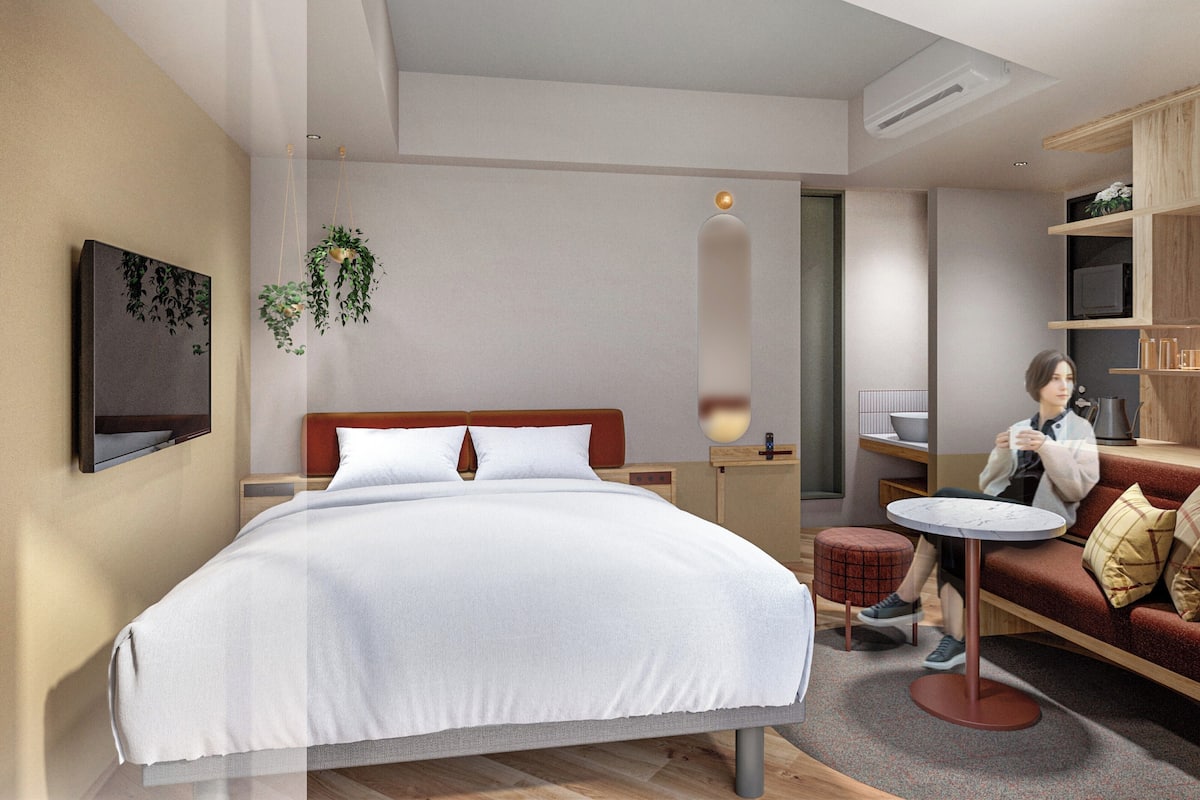 Premium bedding, down duvets, memory-foam beds, in-room safe